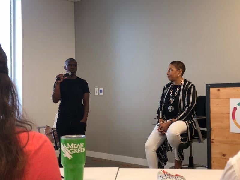 Janiece Evans-Page being introduced to the Women of YourCause ERG by Odessa Jenkins, Vice President of Client Services, before she spoke to the group on Wednesday, June 13th, 2018.