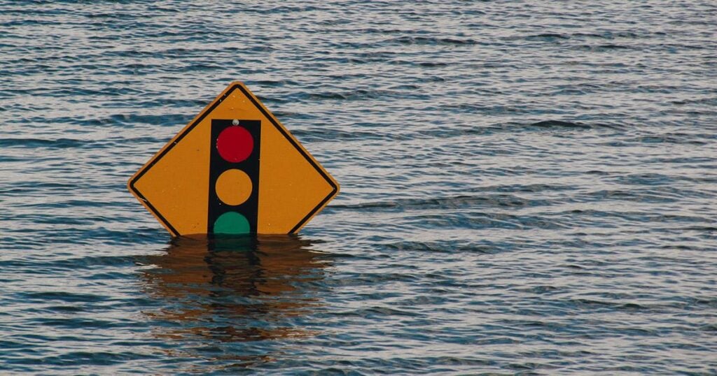 a street sign in deep water