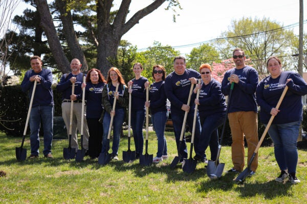 Columbia Bank employees planting trees in their local community